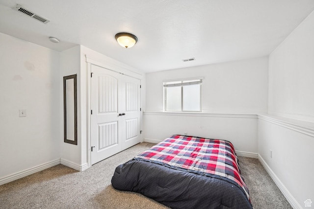 3195 N 1350 W, Pleasant View, UT 84414 - carpeted bedroom featuring baseboards and a closet