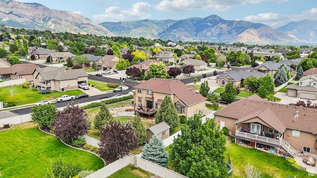 3195 N 1350 W, Pleasant View, UT 84414 - aerial view of residential area featuring a mountainous background