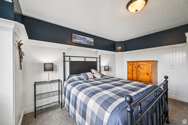 3195 N 1350 W, Pleasant View, UT 84414 - carpeted bedroom with baseboards and a textured ceiling