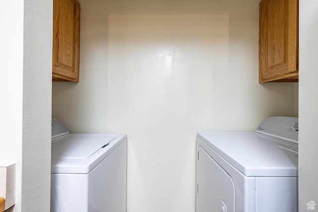 6955 N 2200 W Unit 4E, Park City, UT 84098 - washroom featuring cabinet space and washing machine and dryer