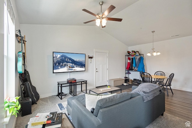 3637 W 1480 N Unit 302, Lehi, UT 84043 - living area featuring a chandelier, vaulted ceiling, a ceiling fan, and wood finished floors