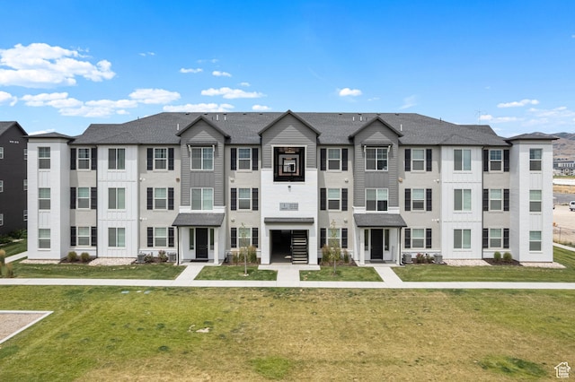 3637 W 1480 N Unit 302, Lehi, UT 84043 - multi unit property with a front yard, a shingled roof, and a residential view