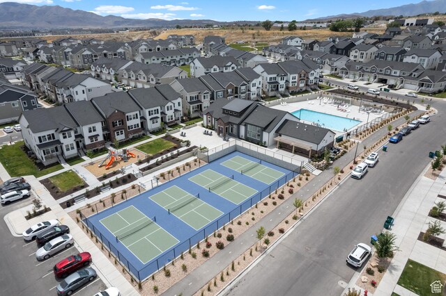 3637 W 1480 N Unit 302, Lehi, UT 84043 - aerial perspective of suburban area featuring a pool area and a mountainous background