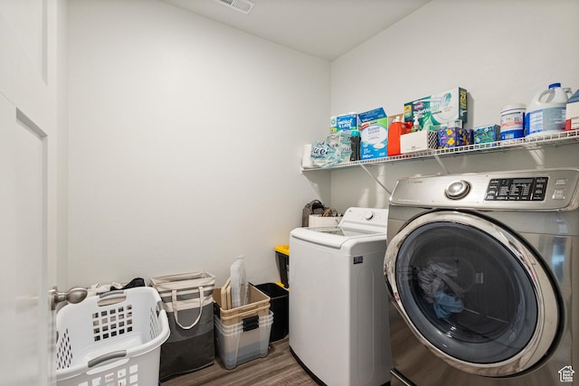 3637 W 1480 N Unit 302, Lehi, UT 84043 - laundry room with separate washer and dryer and wood finished floors