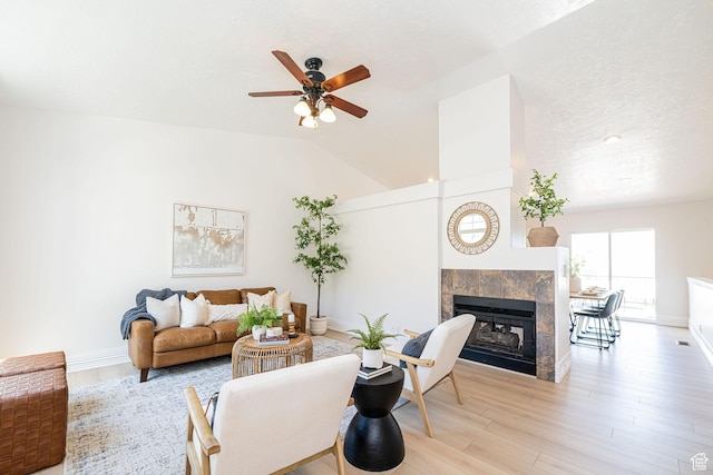 383 E Manti Dr S, Draper, UT 84020 - living room featuring a ceiling fan, wood finished floors, a fireplace, and vaulted ceiling