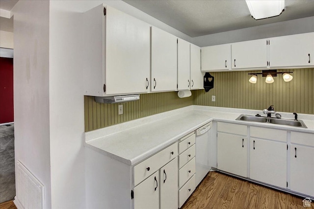 1917 S Main St Unit 7A, Bountiful, UT 84010 - kitchen featuring wood finished floors, white cabinetry, and light countertops