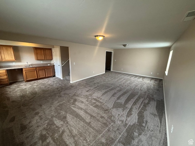 576 S 400 E, Santaquin, UT 84655 - unfurnished living room featuring a sink and dark carpet