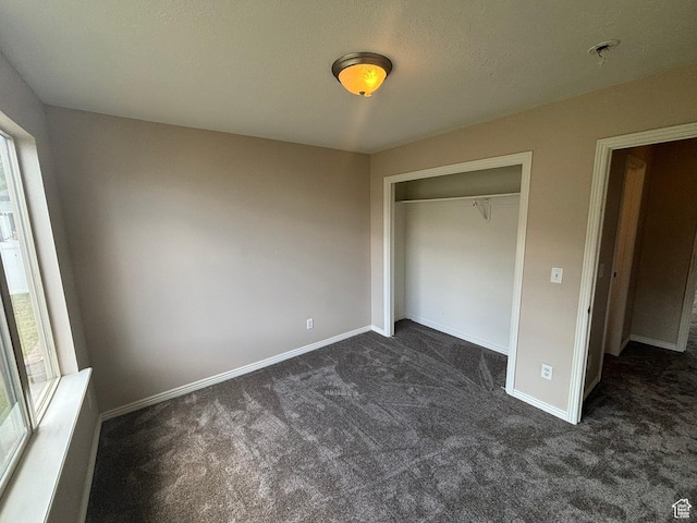 576 S 400 E, Santaquin, UT 84655 - unfurnished bedroom with dark carpet and a closet