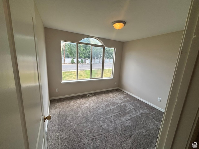 576 S 400 E, Santaquin, UT 84655 - spare room featuring dark colored carpet and baseboards