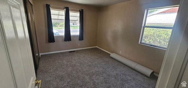 660 N 300 E, Price, UT 84501 - carpeted spare room featuring baseboards