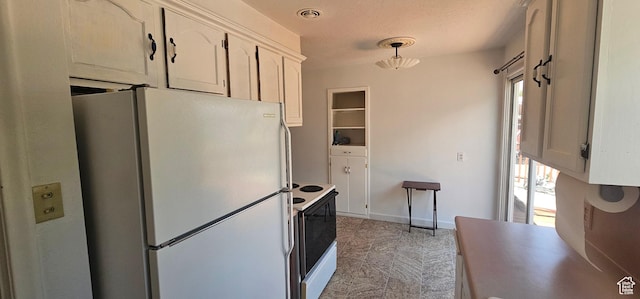 660 N 300 E, Price, UT 84501 - kitchen with white appliances and light countertops