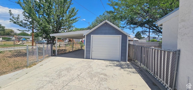 660 N 300 E, Price, UT 84501 - garage featuring a garage and driveway