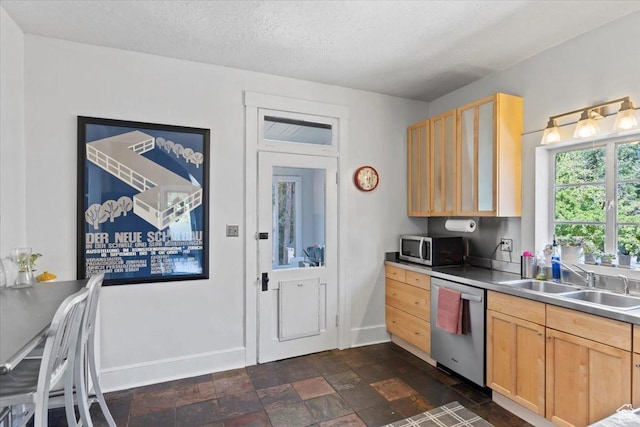 368 S 1100 E, Salt Lake City, UT 84102 - kitchen with appliances with stainless steel finishes, light brown cabinets, dark stone finish flooring, a textured ceiling, and light countertops