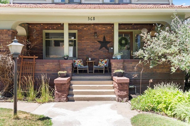 368 S 1100 E, Salt Lake City, UT 84102 - entrance to property with a porch and brick siding