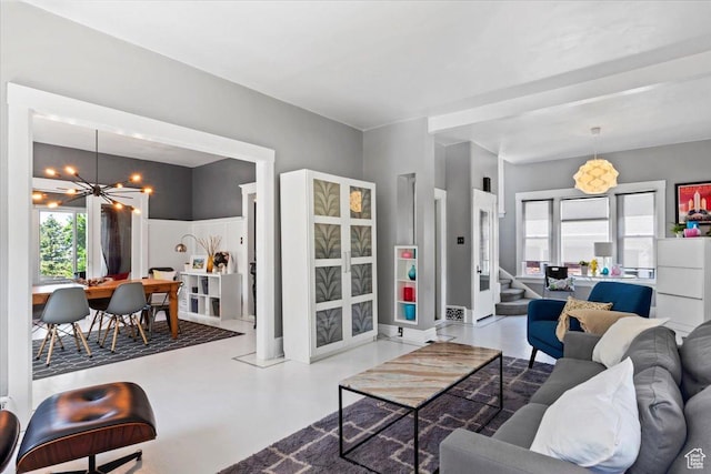 368 S 1100 E, Salt Lake City, UT 84102 - living area featuring a chandelier and concrete floors