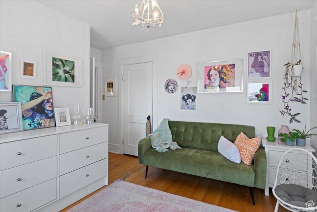 368 S 1100 E, Salt Lake City, UT 84102 - living room with wood finished floors and a chandelier