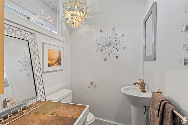 368 S 1100 E, Salt Lake City, UT 84102 - half bath featuring toilet and a chandelier