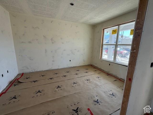 432 W Sapphire Dr Unit 7012, Tooele, UT 84074 - spare room with a textured ceiling