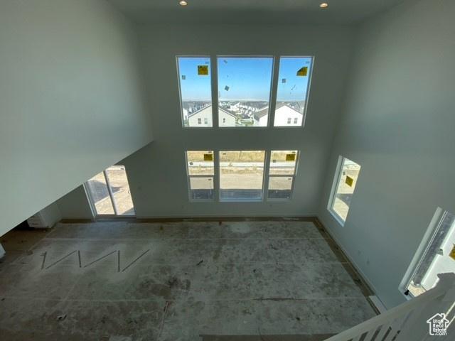 432 W Sapphire Dr Unit 7012, Tooele, UT 84074 - unfurnished living room with recessed lighting