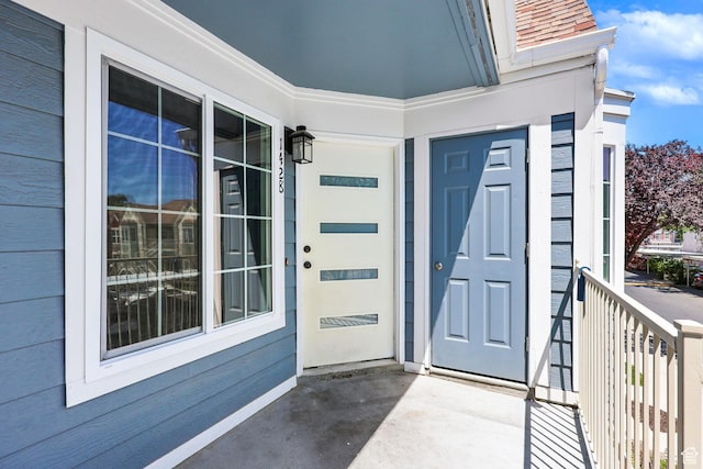 1428 W Beacon Hill Cir S Unit 1428, Salt Lake City, UT 84123 - view of exterior entry featuring a porch