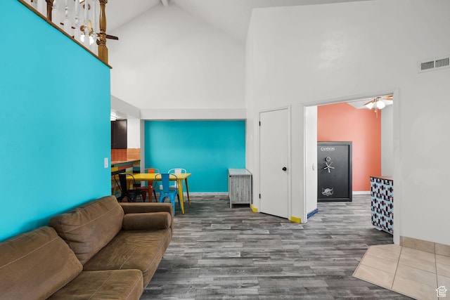1428 W Beacon Hill Cir S Unit 1428, Salt Lake City, UT 84123 - living area with high vaulted ceiling, a ceiling fan, and wood finished floors