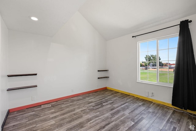 1428 W Beacon Hill Cir S Unit 1428, Salt Lake City, UT 84123 - unfurnished room with wood finished floors, recessed lighting, and lofted ceiling