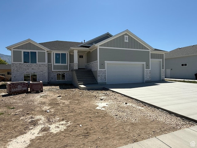 3274 N 2500 W, Farr West, UT 84404 - craftsman-style house featuring board and batten siding, stone siding, and a garage