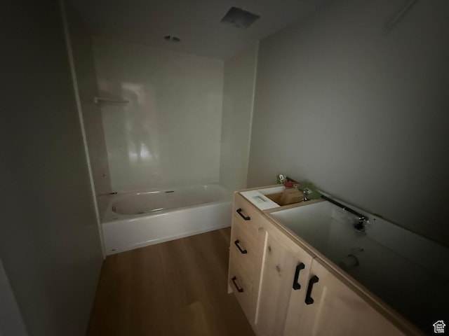 3274 N 2500 W, Farr West, UT 84404 - full bathroom with wood finished floors, vanity, and shower / tub combination