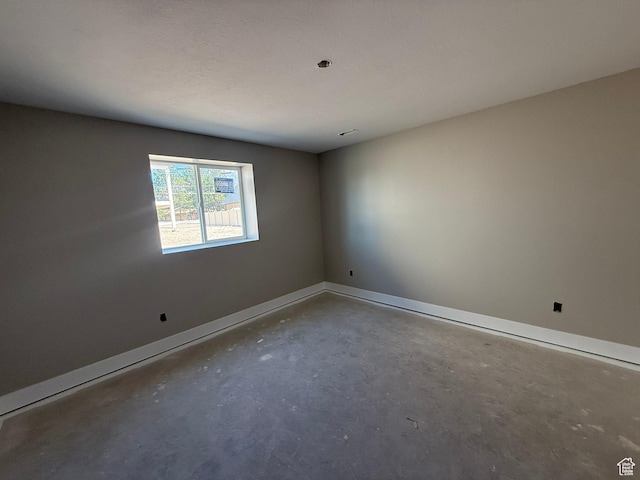 3274 N 2500 W, Farr West, UT 84404 - unfurnished room featuring concrete floors and baseboards