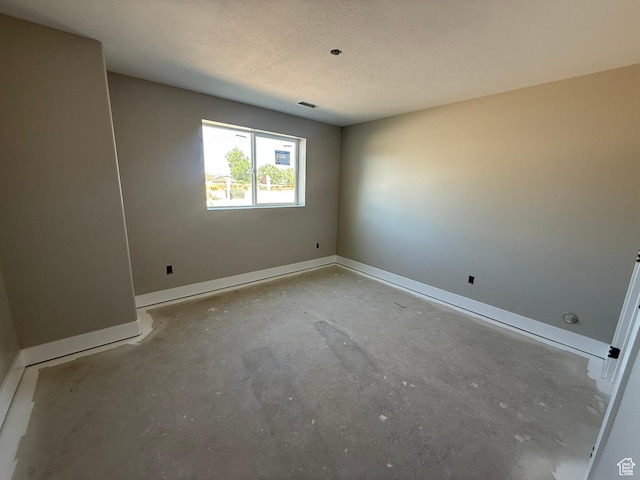 3274 N 2500 W, Farr West, UT 84404 - spare room featuring baseboards and unfinished concrete flooring