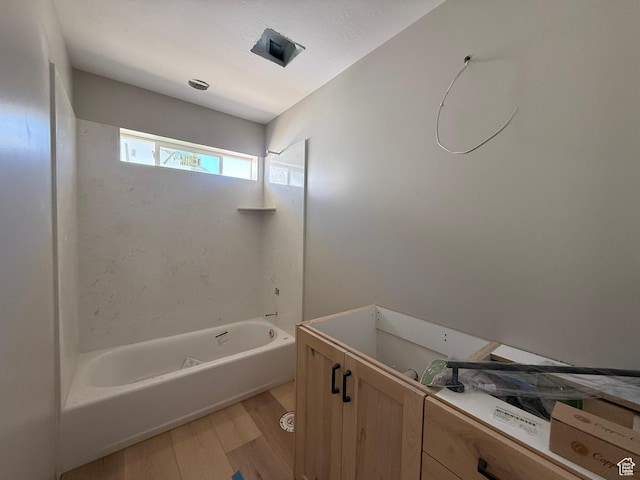 3274 N 2500 W, Farr West, UT 84404 - bathroom with wood finished floors, shower / tub combination, and vanity