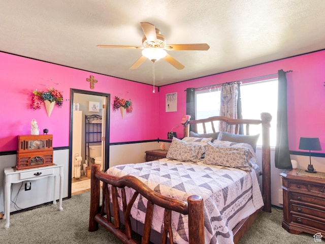 3646 S Elk Point Dr, Magna, UT 84044 - carpeted bedroom featuring a ceiling fan and connected bathroom