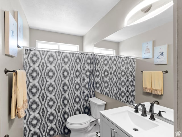 3646 S Elk Point Dr, Magna, UT 84044 - full bathroom featuring vanity and curtained shower