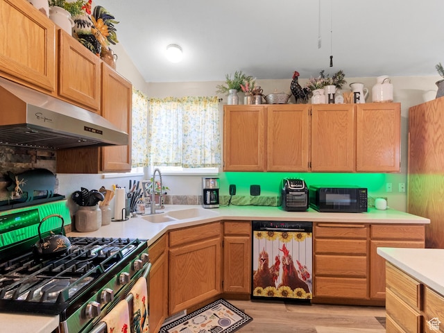 3646 S Elk Point Dr, Magna, UT 84044 - kitchen with dishwasher, gas stove, black microwave, light countertops, and under cabinet range hood