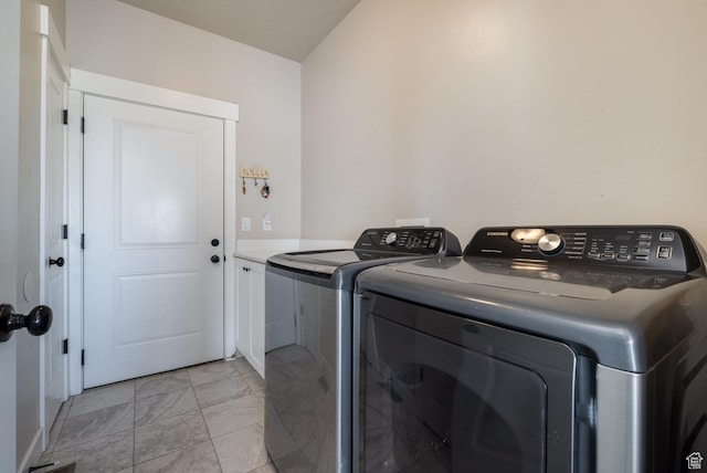 933 S 250 W, Vernal, UT 84078 - washroom with washer and clothes dryer, light marble finish flooring, and cabinet space