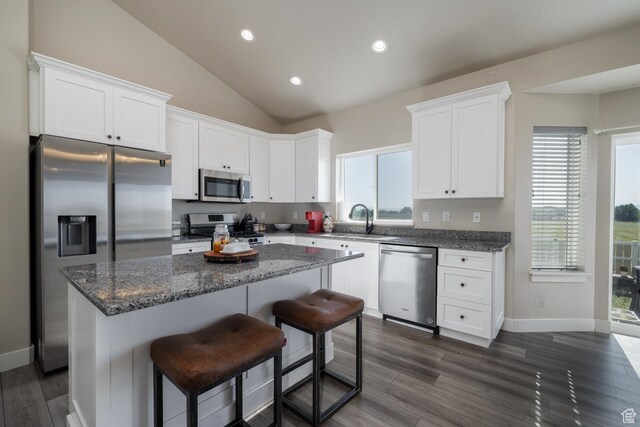 933 S 250 W, Vernal, UT 84078 - kitchen with appliances with stainless steel finishes, white cabinetry, a kitchen island, recessed lighting, and dark wood finished floors