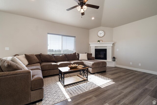 933 S 250 W, Vernal, UT 84078 - living area with a ceiling fan, wood finished floors, vaulted ceiling, recessed lighting, and a glass covered fireplace