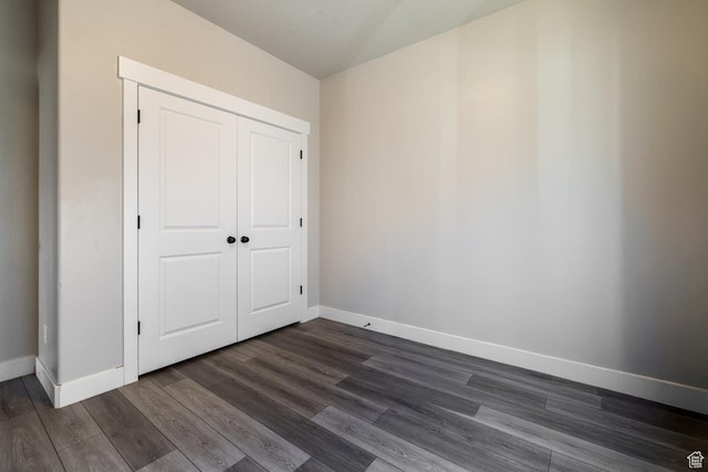 933 S 250 W, Vernal, UT 84078 - unfurnished bedroom with dark wood-type flooring and a closet