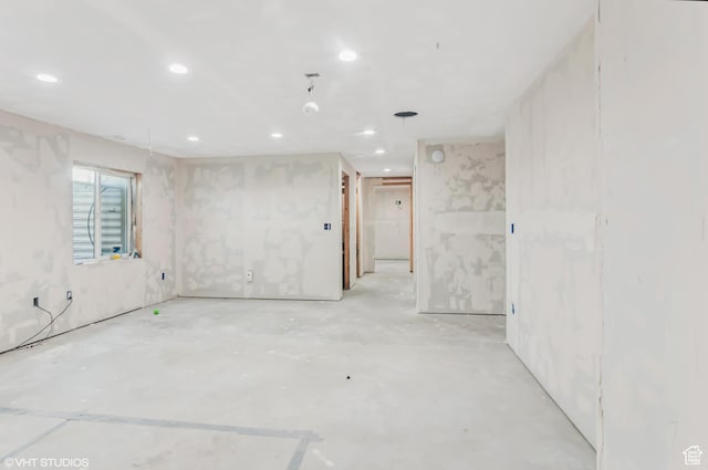 2086 W White Pine Dr S, Layton, UT 84041 - empty room featuring recessed lighting and concrete flooring