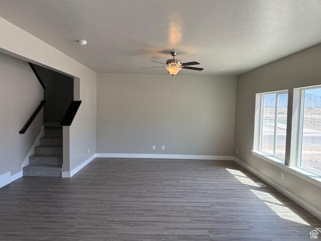 482 N 460 E Lot 6, Salem, UT 84653 - unfurnished living room with a ceiling fan, wood finished floors, a textured ceiling, and stairway