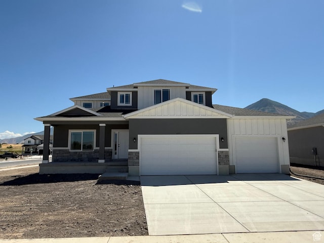 482 N 460 E Lot 6, Salem, UT 84653 - view of front of house with a garage, board and batten siding, stone siding, driveway, and covered porch