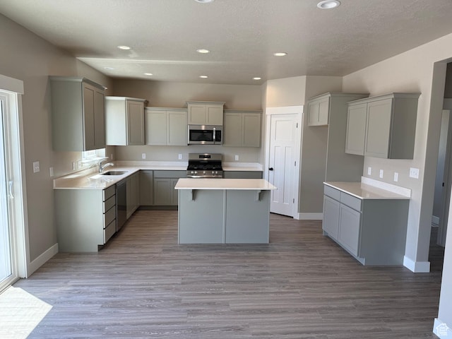 482 N 460 E Lot 6, Salem, UT 84653 - kitchen featuring stainless steel appliances, a center island, gray cabinets, recessed lighting, and light wood finished floors
