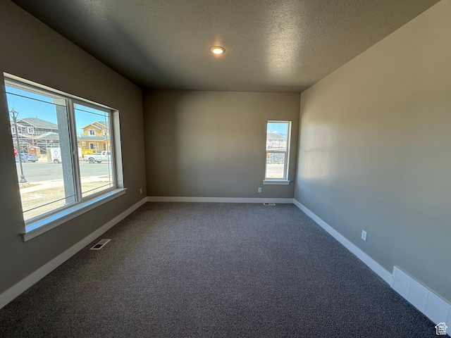 482 N 460 E Lot 6, Salem, UT 84653 - spare room with dark carpet and a textured ceiling