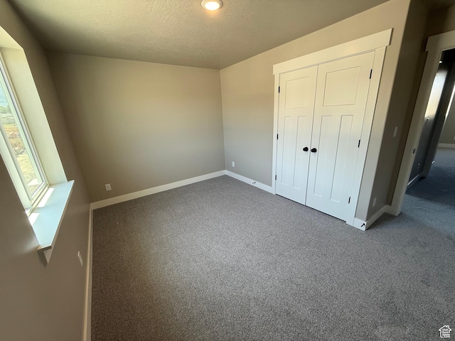 482 N 460 E Lot 6, Salem, UT 84653 - unfurnished bedroom featuring carpet floors, a textured ceiling, and a closet
