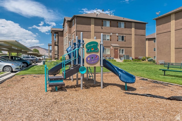3569 E Rock Creek Rd Unit G1, Eagle Mountain, UT 84005 - community playground featuring a yard and a mountain view