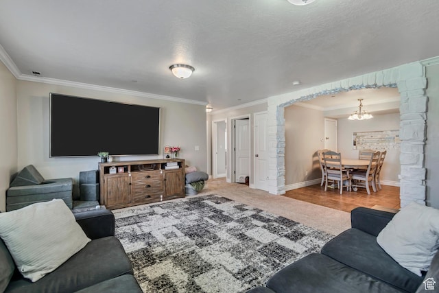 3569 E Rock Creek Rd Unit G1, Eagle Mountain, UT 84005 - living area featuring a chandelier and crown molding