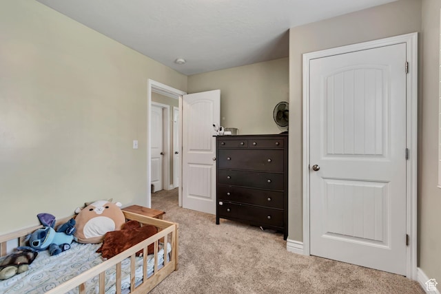 3569 E Rock Creek Rd Unit G1, Eagle Mountain, UT 84005 - bedroom featuring light colored carpet and baseboards