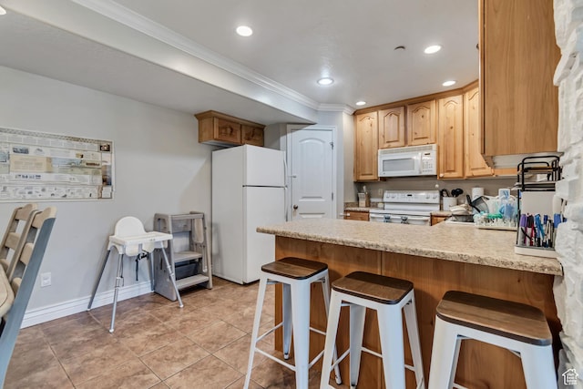 3569 E Rock Creek Rd Unit G1, Eagle Mountain, UT 84005 - kitchen with white appliances, a peninsula, ornamental molding, light tile patterned floors, and a kitchen bar