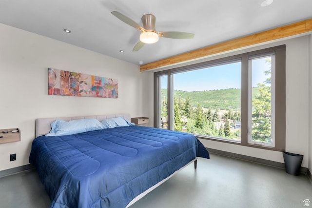 105 S Crestview Cir, Park City, UT 84098 - bedroom with multiple windows, concrete flooring, recessed lighting, and a ceiling fan