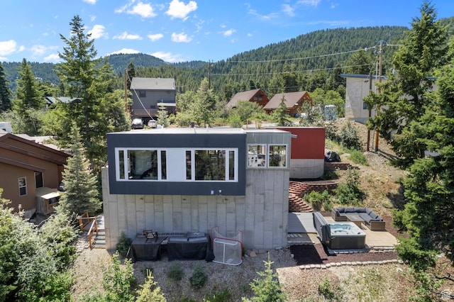105 S Crestview Cir, Park City, UT 84098 - view of home's exterior featuring a view of trees, a mountain view, an outdoor living space with a fire pit, and a patio area